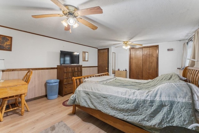 30 Stone St, Bellingham, MA 02019 - bedroom featuring light wood-style flooring, wainscoting, and ceiling fan