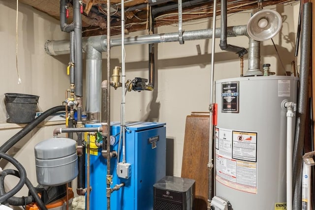 30 Stone St, Bellingham, MA 02019 - utility room featuring water heater and a heating unit