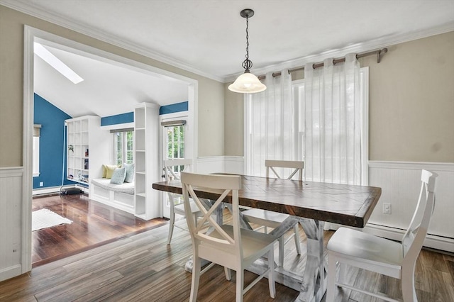 323 School St, Pembroke, MA 02359 - dining area with a wainscoted wall, wood finished floors, vaulted ceiling, ornamental molding, and baseboard heating