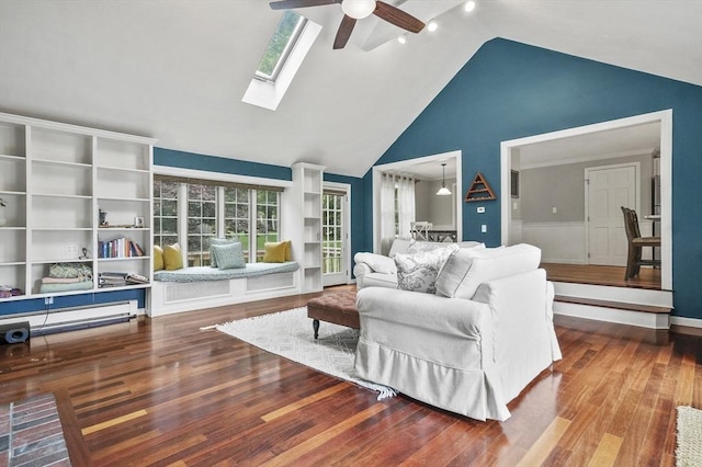 323 School St, Pembroke, MA 02359 - living room featuring a ceiling fan, wood finished floors, plenty of natural light, high vaulted ceiling, and a skylight
