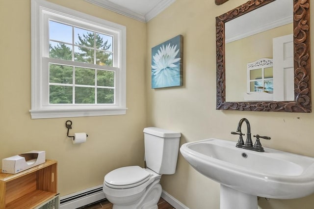 323 School St, Pembroke, MA 02359 - half bath with baseboard heating, healthy amount of natural light, and ornamental molding
