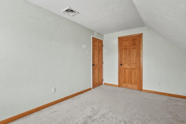 323 School St, Pembroke, MA 02359 - bonus room with lofted ceiling and light carpet