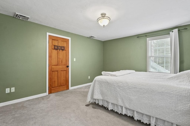 323 School St, Pembroke, MA 02359 - carpeted bedroom with baseboards