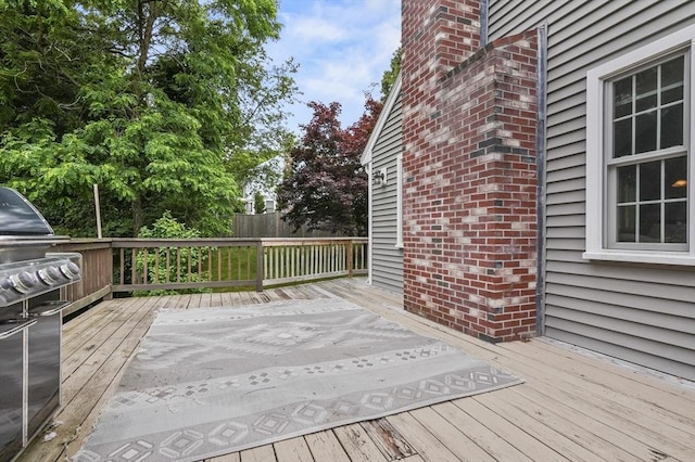 323 School St, Pembroke, MA 02359 - wooden deck featuring a grill