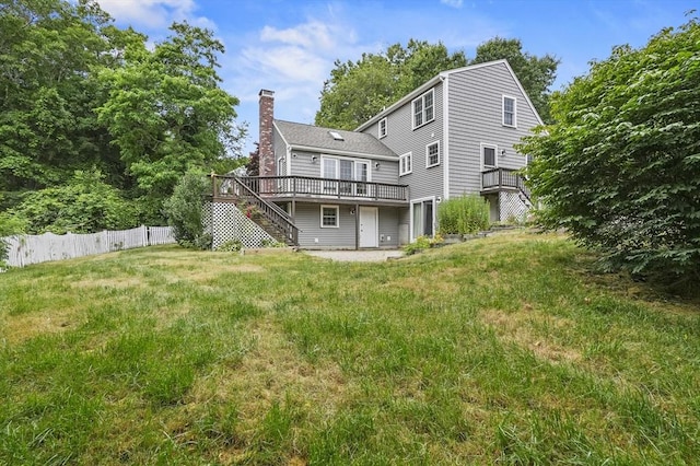323 School St, Pembroke, MA 02359 - rear view of property featuring stairs, a wooden deck, and a chimney