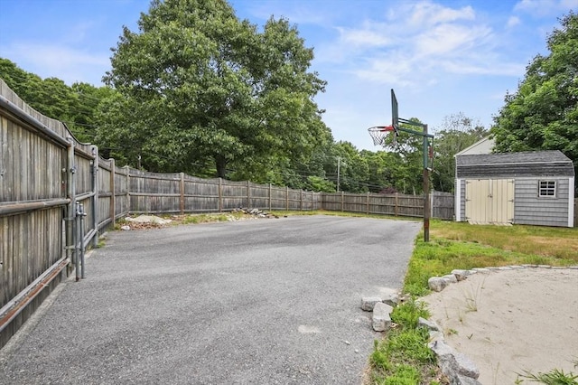 323 School St, Pembroke, MA 02359 - fenced backyard with a shed