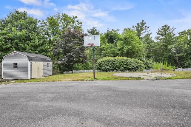 323 School St, Pembroke, MA 02359 - view of patio / terrace with a storage shed