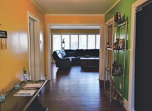 corridor with crown molding and dark wood-type flooring