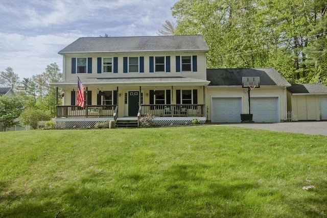 40 Coffey Hill Rd, Ware, MA 01082 - colonial-style house featuring an attached garage, covered porch, a front yard, and asphalt driveway