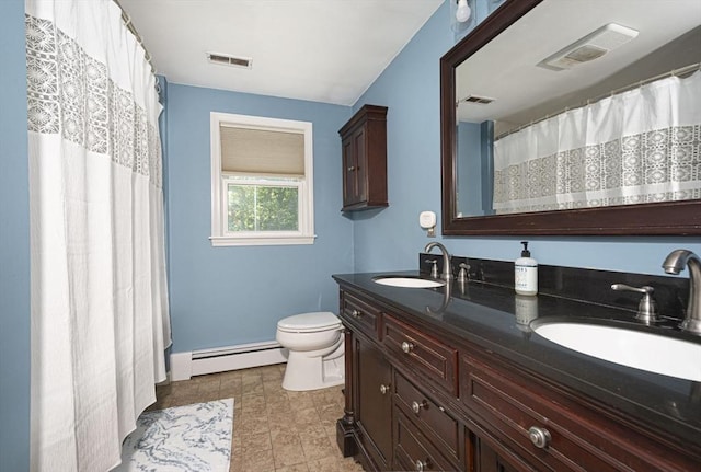 14 Robbins Rd, Ayer, MA 01432 - bathroom featuring a baseboard heating unit, double vanity, a shower with shower curtain, and tile patterned floors