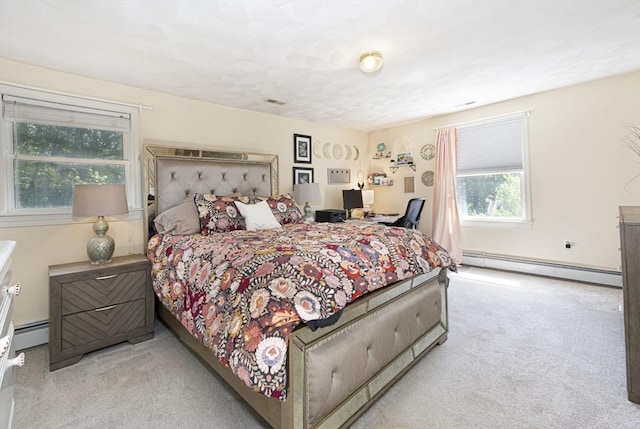 14 Robbins Rd, Ayer, MA 01432 - bedroom featuring baseboard heating and light colored carpet
