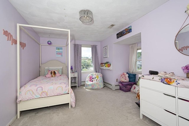 14 Robbins Rd, Ayer, MA 01432 - carpeted bedroom featuring a baseboard radiator