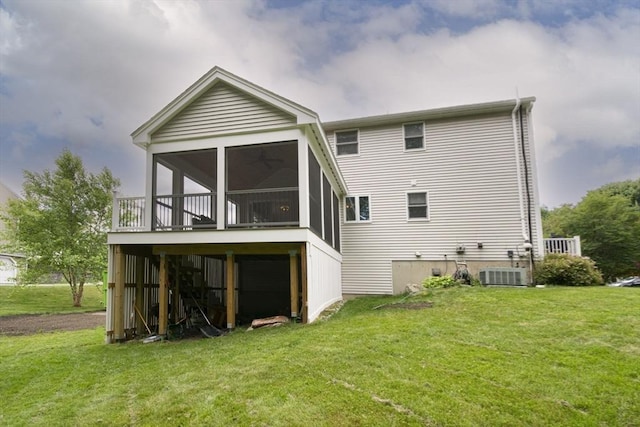 14 Robbins Rd, Ayer, MA 01432 - rear view of house featuring a sunroom and a yard