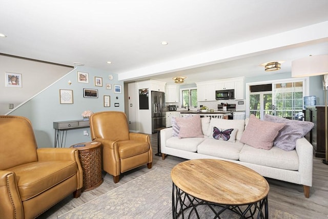 14 Robbins Rd, Ayer, MA 01432 - living area with light wood-type flooring and recessed lighting