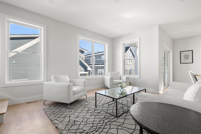62 Albertina St Unit D, Quincy, MA 02169 - living room with wood finished floors and baseboards