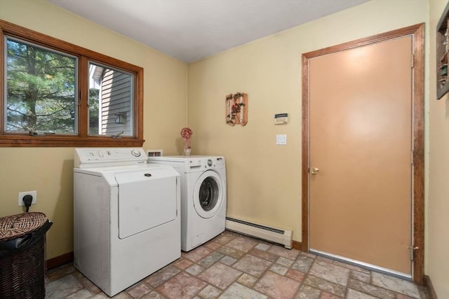 2 Lake Ave, Framingham, MA 01702 - laundry room with a baseboard heating unit, washer and dryer, stone finish floors, and baseboards