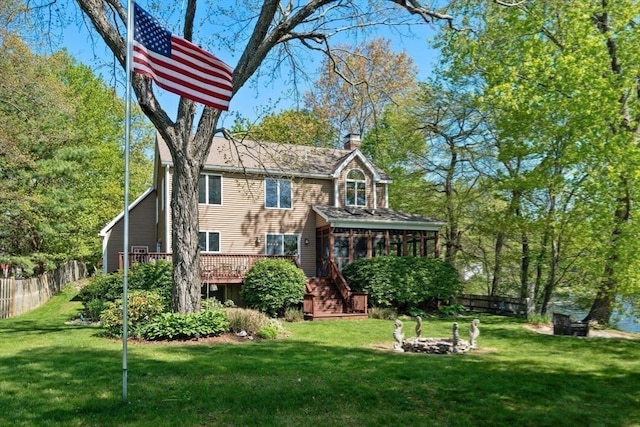 2 Lake Ave, Framingham, MA 01702 - rear view of house with a sunroom, a chimney, stairs, and a deck