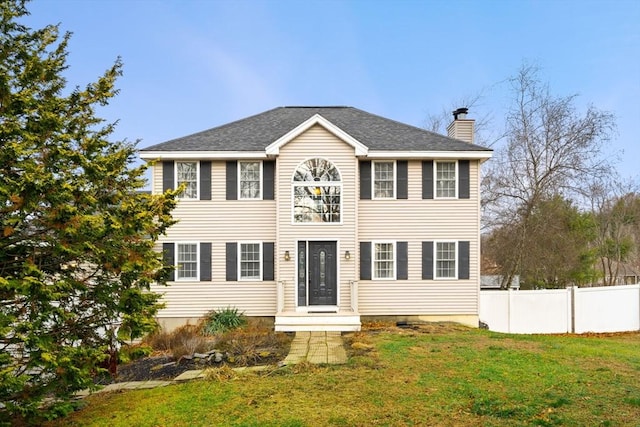 colonial house with a front lawn