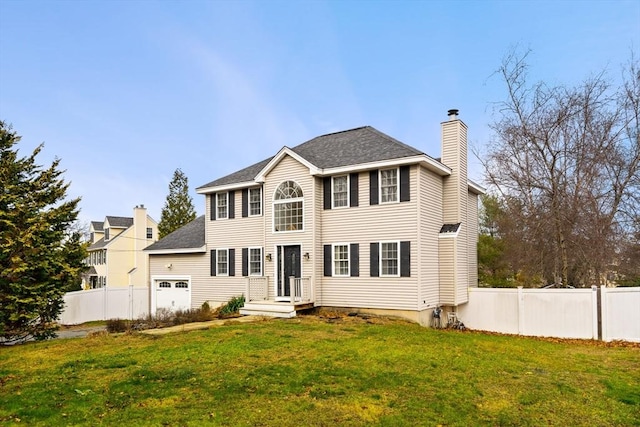 colonial home with a front lawn