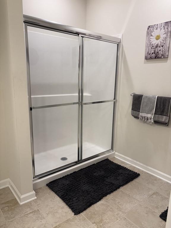 12101 Peters Farm Way Unit 12101, Westborough, MA 01581 - bathroom featuring baseboards and a shower stall