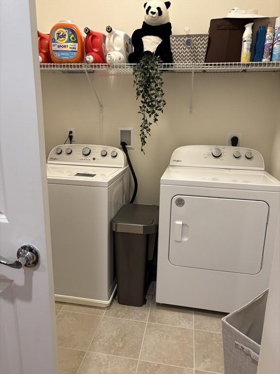 12101 Peters Farm Way Unit 12101, Westborough, MA 01581 - washroom with independent washer and dryer and light tile patterned floors