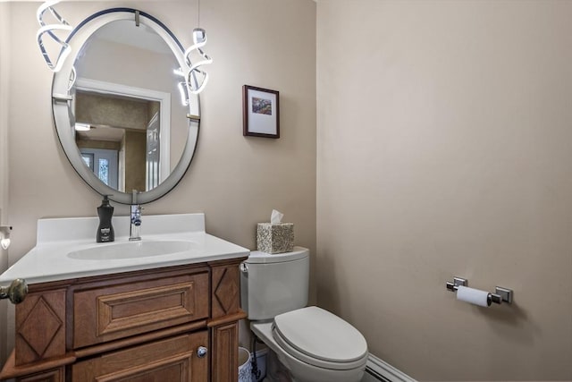 bathroom featuring toilet and vanity