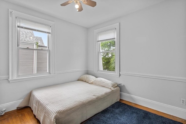 38 Torrey St, Boston, MA 02124 - bedroom featuring wood finished floors, baseboards, and a ceiling fan