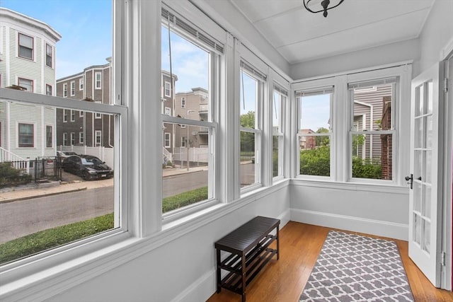 38 Torrey St, Boston, MA 02124 - sunroom featuring baseboards, plenty of natural light, and wood finished floors