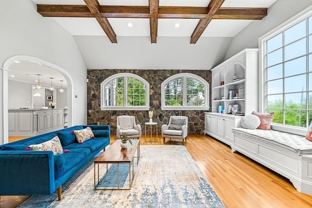 4 Worthen Rd, Winchester, MA 01890 - living area featuring light wood finished floors, arched walkways, and coffered ceiling