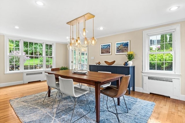 4 Worthen Rd, Winchester, MA 01890 - dining space with radiator heating unit, a chandelier, baseboards, recessed lighting, and ornamental molding