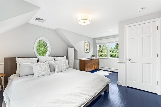 4 Worthen Rd, Winchester, MA 01890 - bedroom with a baseboard heating unit, dark wood-style floors, and vaulted ceiling