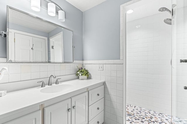 4 Worthen Rd, Winchester, MA 01890 - full bathroom featuring a stall shower, vanity, and tile walls
