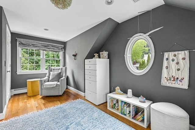 4 Worthen Rd, Winchester, MA 01890 - living area with a baseboard radiator, wood finished floors, and baseboards