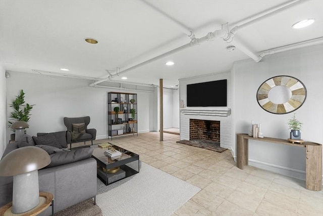 4 Worthen Rd, Winchester, MA 01890 - living area featuring recessed lighting, a fireplace with raised hearth, and baseboards