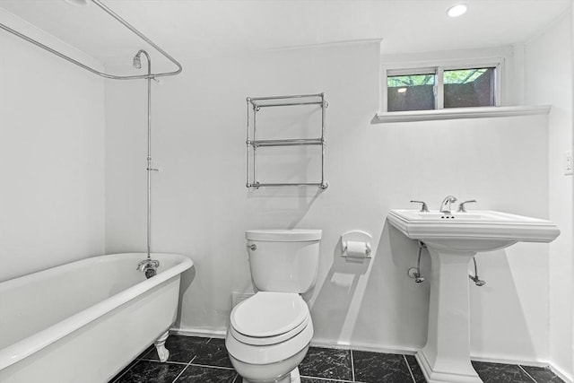 4 Worthen Rd, Winchester, MA 01890 - full bathroom with a soaking tub, baseboards, marble finish flooring, and toilet
