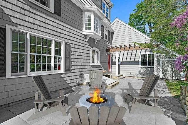 4 Worthen Rd, Winchester, MA 01890 - view of patio featuring a fire pit and a pergola
