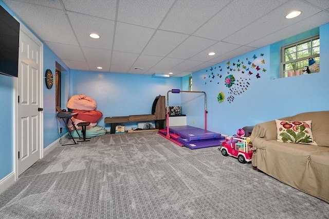 game room featuring carpet floors, recessed lighting, baseboards, and a paneled ceiling