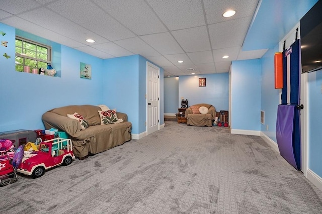 recreation room with carpet floors, recessed lighting, baseboards, and a paneled ceiling