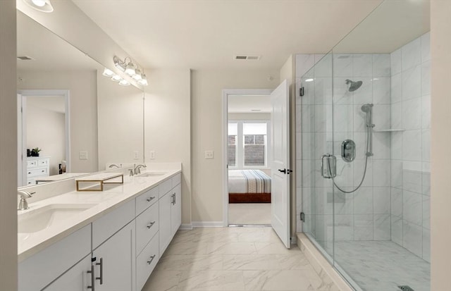 15 Mason Way Unit 73, Woburn, MA 01801 - ensuite bathroom featuring marble finish floors, double vanity, and a shower stall