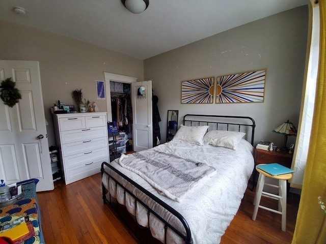 bedroom featuring a closet and hardwood / wood-style floors