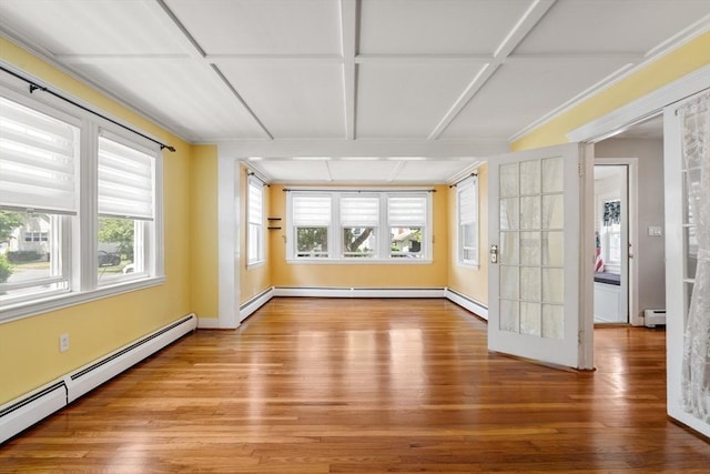 7 Coolidge Rd, Danvers, MA 01923 - spare room featuring a baseboard radiator, hardwood / wood-style flooring, healthy amount of natural light, and coffered ceiling