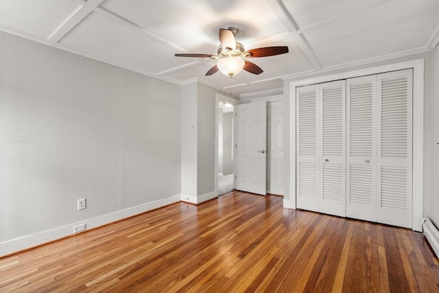 7 Coolidge Rd, Danvers, MA 01923 - unfurnished bedroom with baseboards, hardwood / wood-style flooring, crown molding, a closet, and a ceiling fan