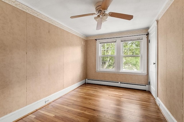 7 Coolidge Rd, Danvers, MA 01923 - unfurnished room featuring a baseboard heating unit, wood-type flooring, baseboards, and ceiling fan