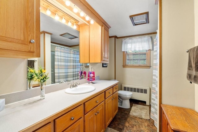 7 Coolidge Rd, Danvers, MA 01923 - full bath featuring radiator, vanity, toilet, and stone finish flooring