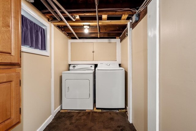7 Coolidge Rd, Danvers, MA 01923 - laundry area featuring dark carpet, independent washer and dryer, and baseboards