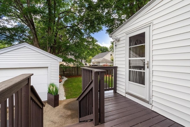 7 Coolidge Rd, Danvers, MA 01923 - wooden terrace featuring a detached garage and an outbuilding