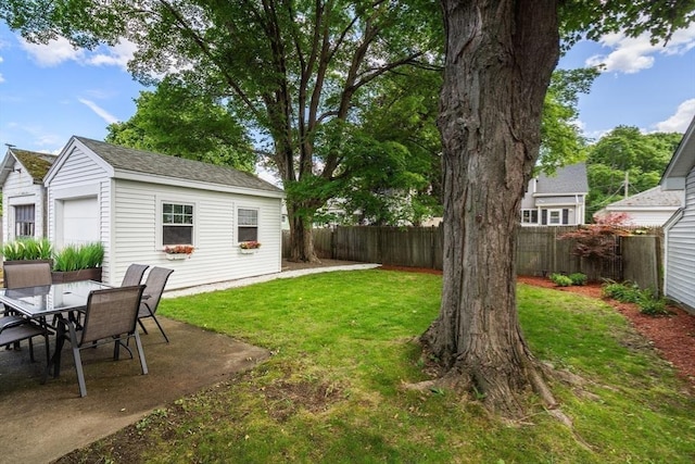 7 Coolidge Rd, Danvers, MA 01923 - view of yard featuring an outbuilding, outdoor dining area, and a patio area