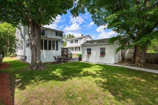 7 Coolidge Rd, Danvers, MA 01923 - rear view of property with an outbuilding and a patio