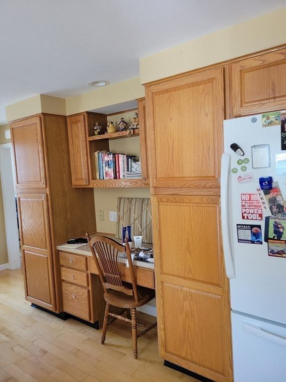 40 June St, Worcester, MA 01602 - office with light wood-style flooring and built in desk