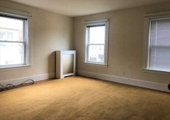 40 June St, Worcester, MA 01602 - carpeted spare room featuring baseboards
